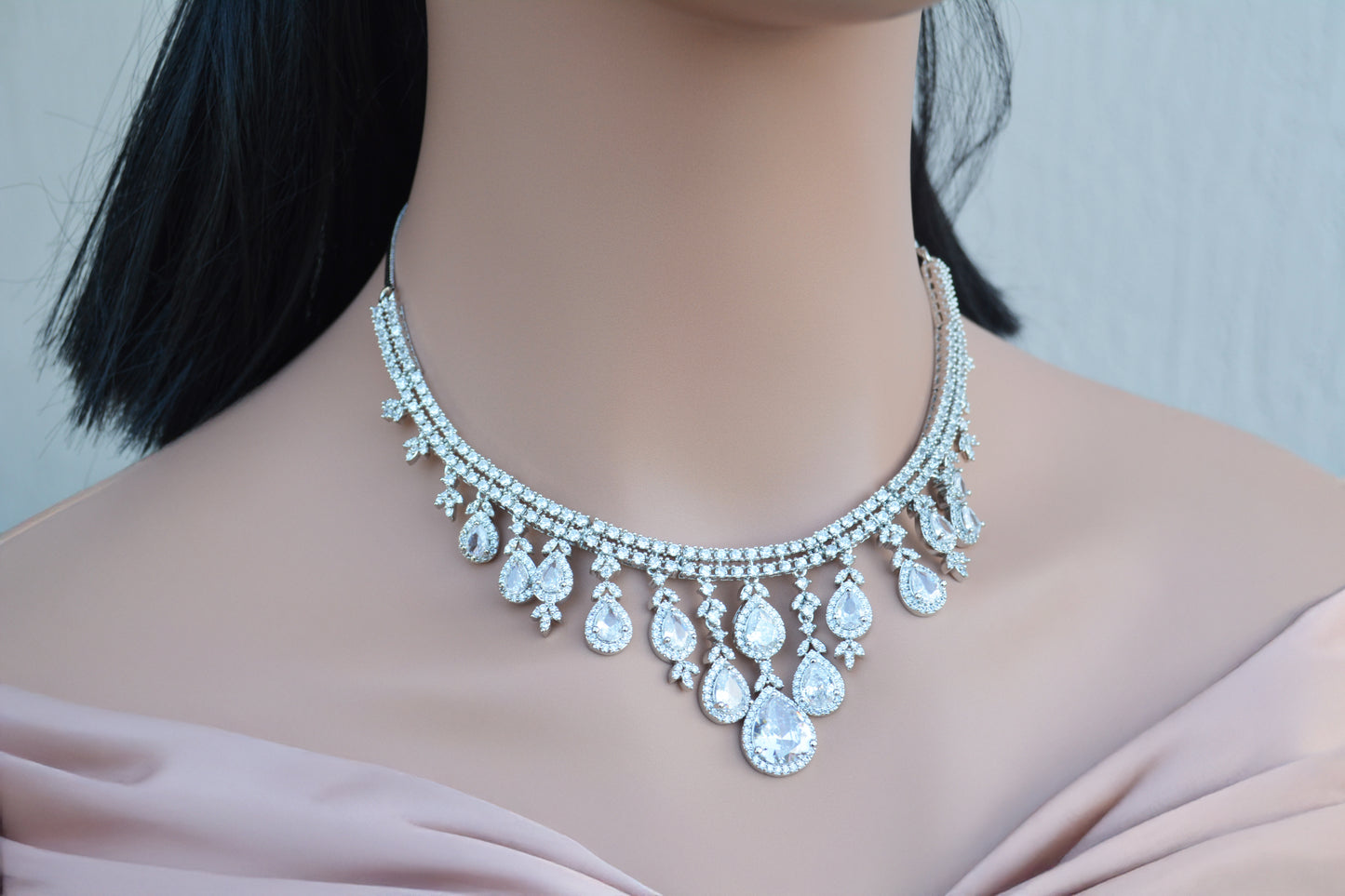 Silver Zircon Embellished A.D Necklace Set with matching earrings